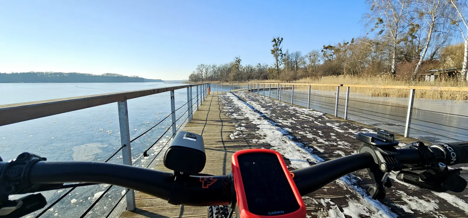 Bike on a jetty over the lake