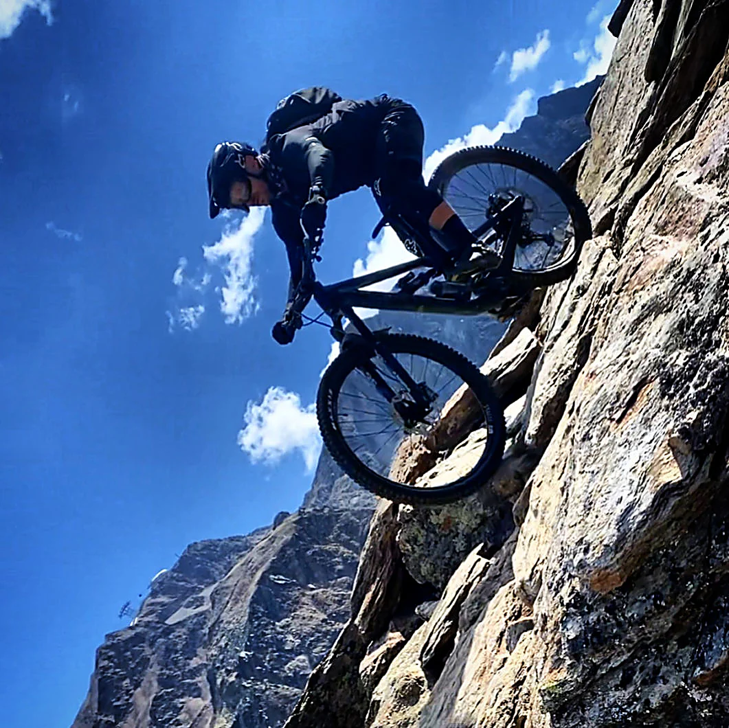 Riding down a rock face in the Sölden bike park